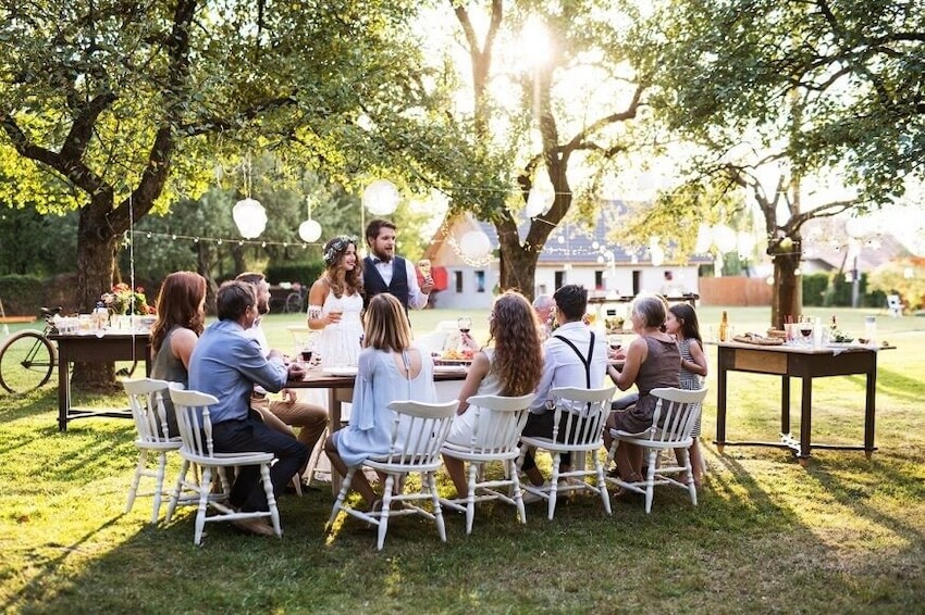 Small wedding ideas: bride and groom talking to their guests